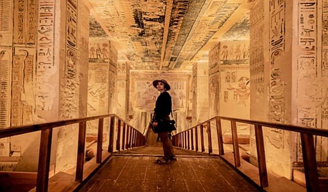 Tourist dressed respectfully visiting the Valley of the Kings in Luxor