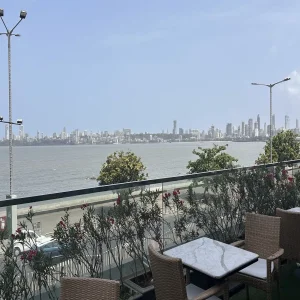 Hotel terrace overlooking Mumbai skyline from InterContinental Marine Drive, India