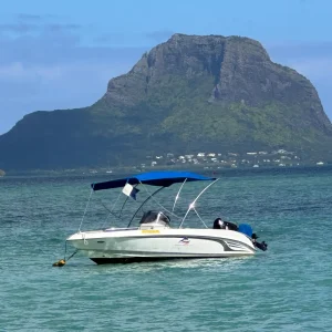 Le Morne mountain dramatic landscape view in Mauritius with lush green hills and blue sky