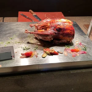 Roast turkey carving station at Iberotel Makadi Beach hotel buffet, Hurghada, Egypt