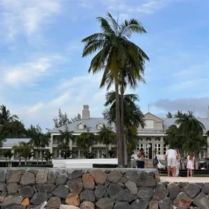 Sugar Beach Resort colonial white buildings with palm trees in Flic-en-Flac, Mauritius