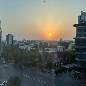 Golden sunset over Jaipur cityscape with modern buildings in Rajasthan, India