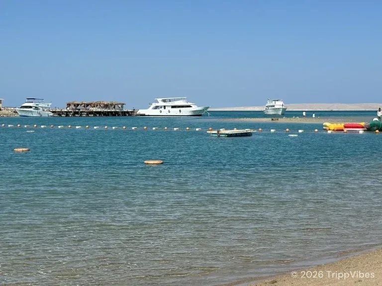 Jaz elite casa del mar beach review view of red sea boats, jetty and shallow clear water